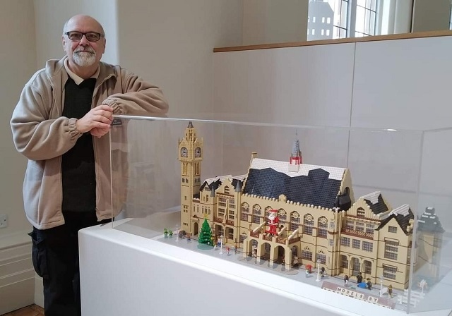 Robert Clarkson with his mini Rochdale Town Hall, which has previously been on display at Touchstones